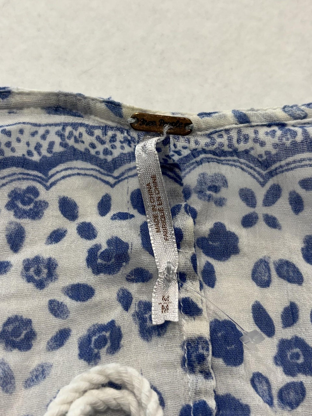 Free People Blouse Womens Medium Blue Long Sleeve Floral Tassel Crop Top Boho