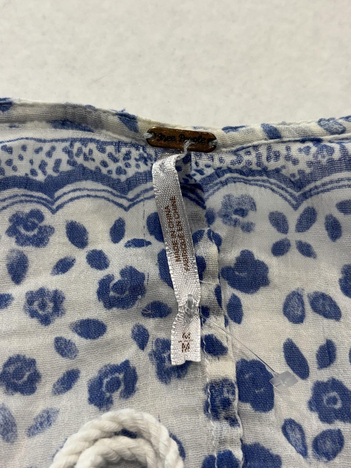 Free People Blouse Womens Medium Blue Long Sleeve Floral Tassel Crop Top Boho