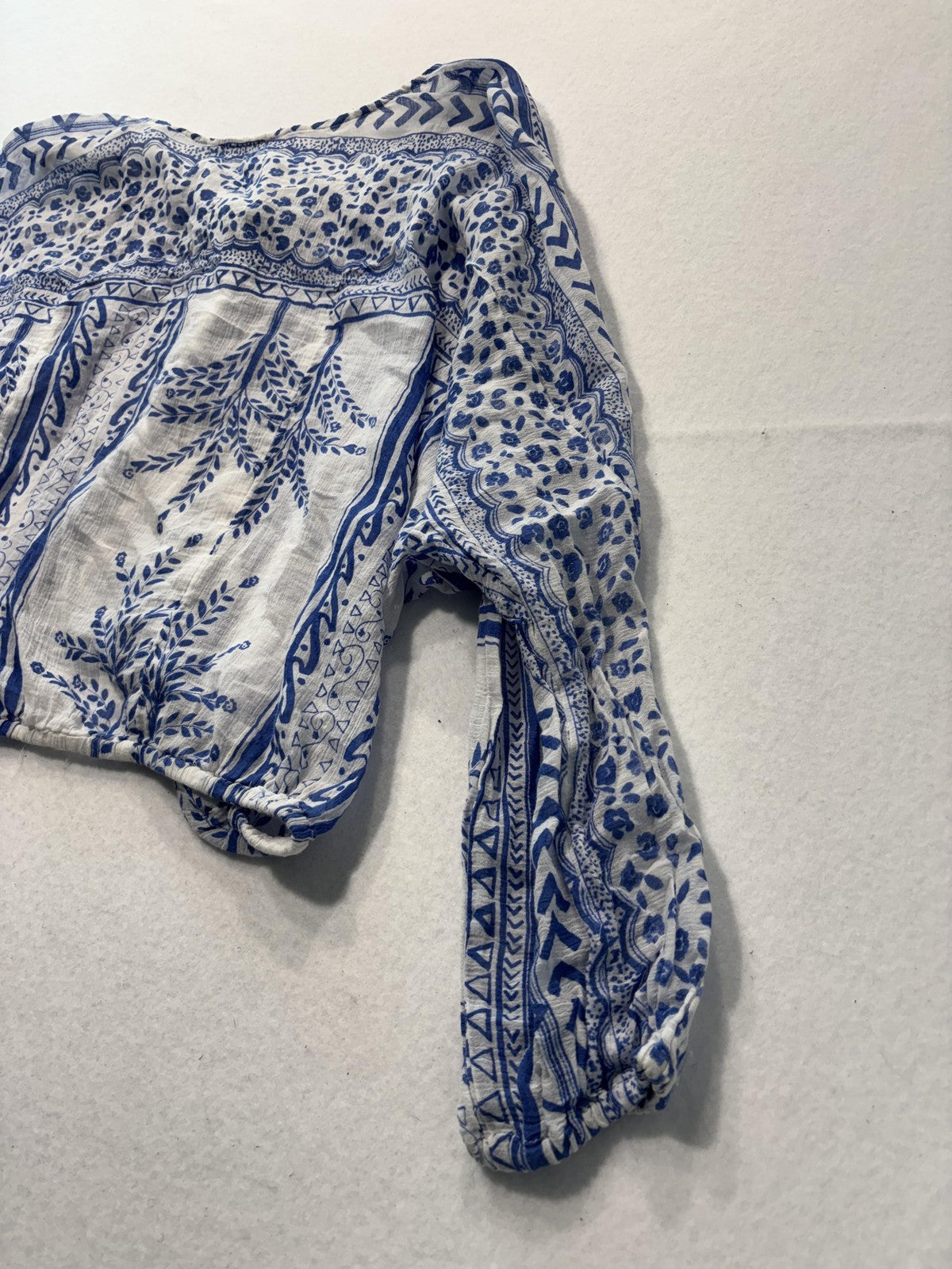 Free People Blouse Womens Medium Blue Long Sleeve Floral Tassel Crop Top Boho