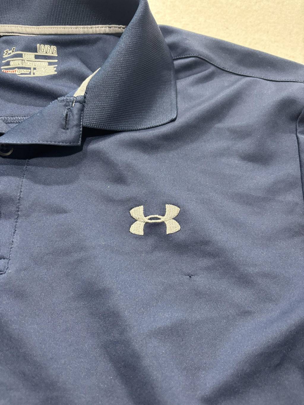 Under Armour HeatGear Polo Shirt Mens Large Blue Loose Fit Golf Logo Performance