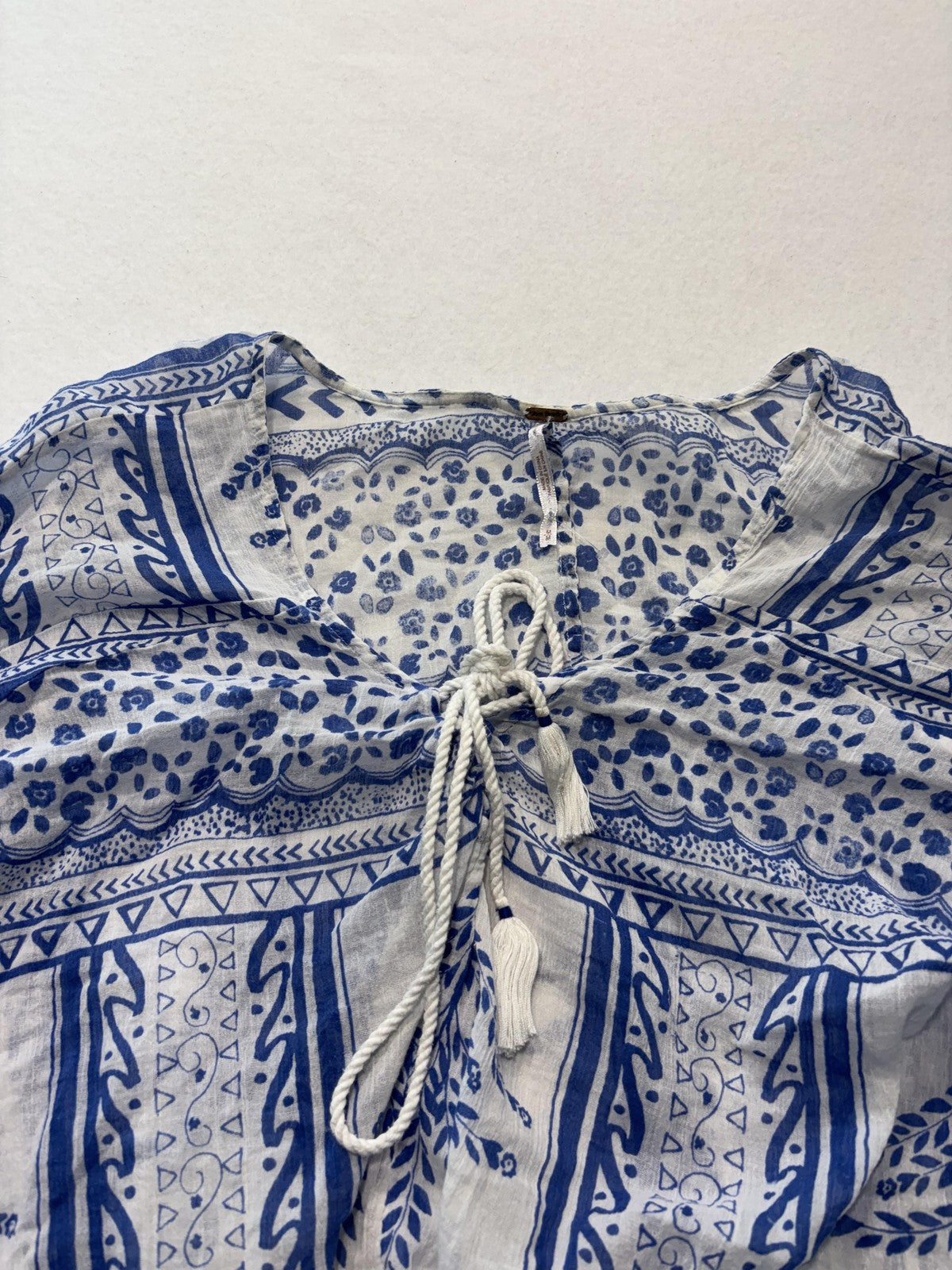 Free People Blouse Womens Medium Blue Long Sleeve Floral Tassel Crop Top Boho