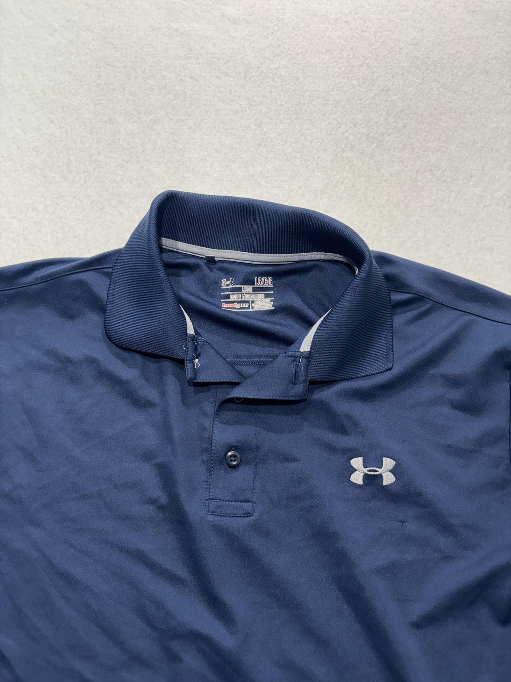 Under Armour HeatGear Polo Shirt Mens Large Blue Loose Fit Golf Logo Performance